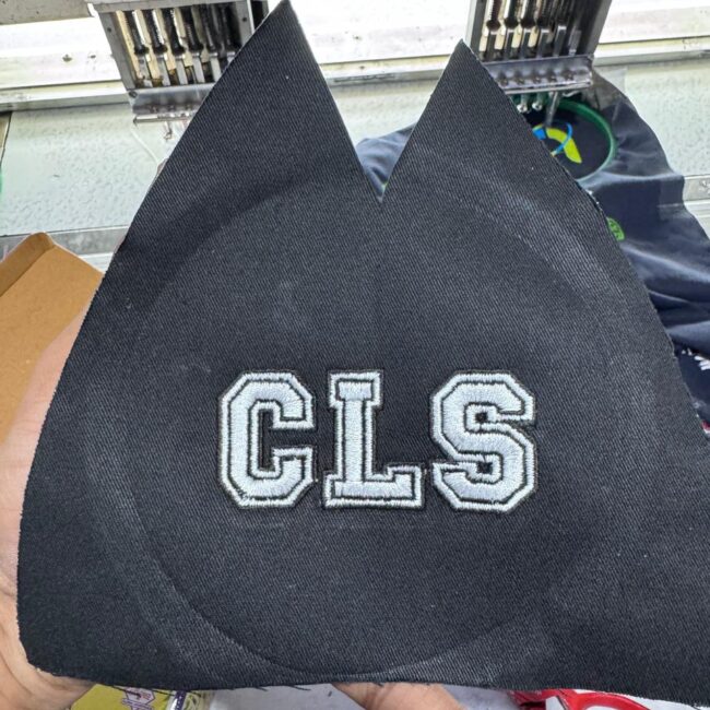 Home Embroidery on cap front panel for MS Cap World, Cap Manufacturer.