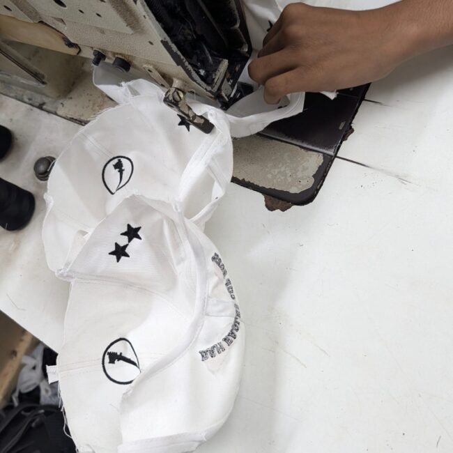 Home making of cap stitching of cap custom caps manufacturer India bulk caps supplier India promotional caps manufacturer customized caps with logo