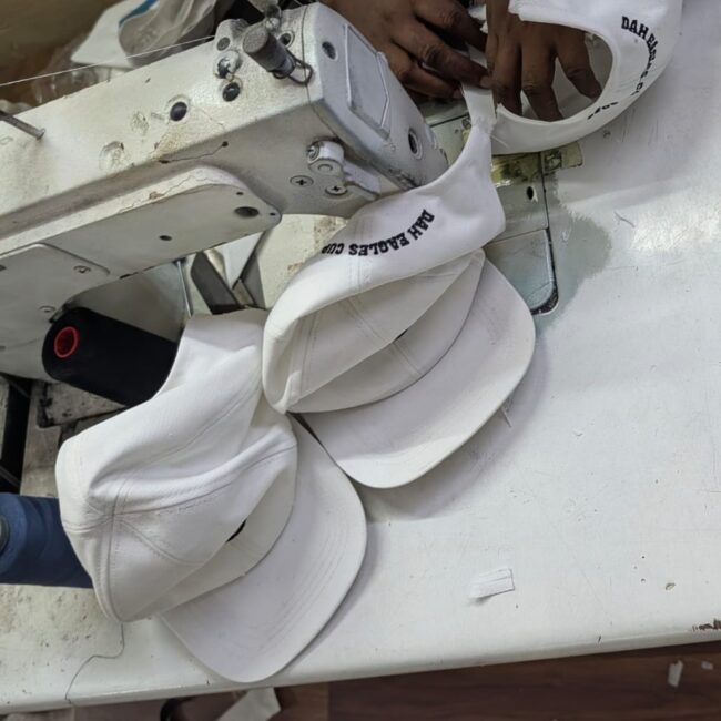 Caps Being stitched at MS Cap WOrld, Cap Manufacturer